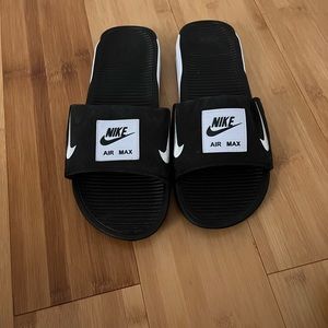 Nike Black and White Slides Mens Size 10. Never worn. No box or tags.